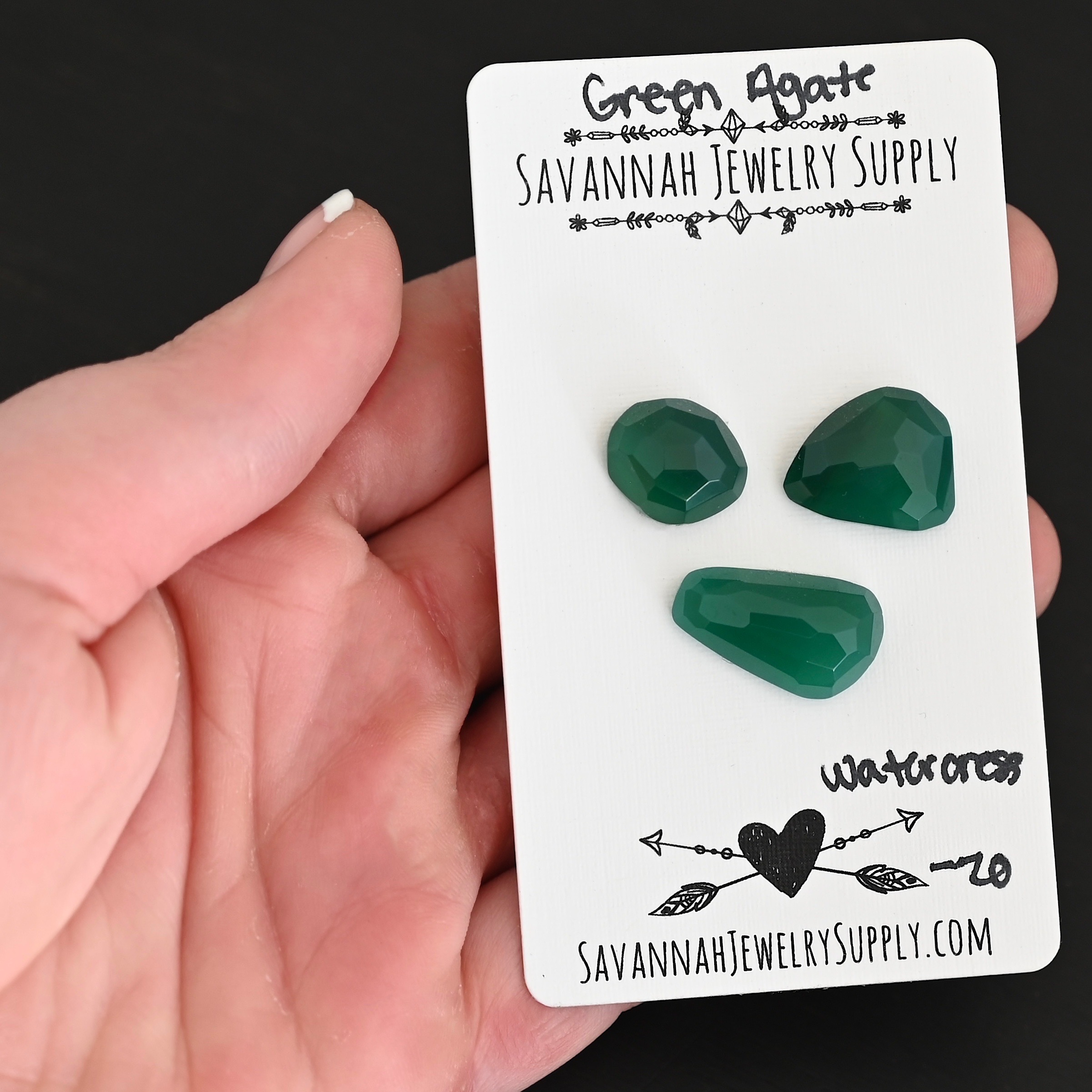 Watercress Rose Cut Green Agate Cabochon Parcel shown in hand