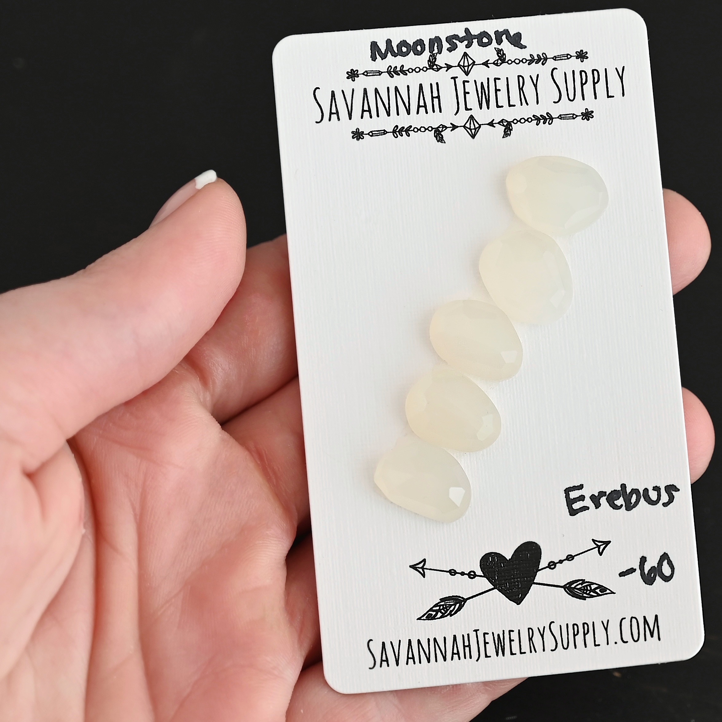 Erebus Rose Cut Moonstone Cabochon Parcel shown in hand