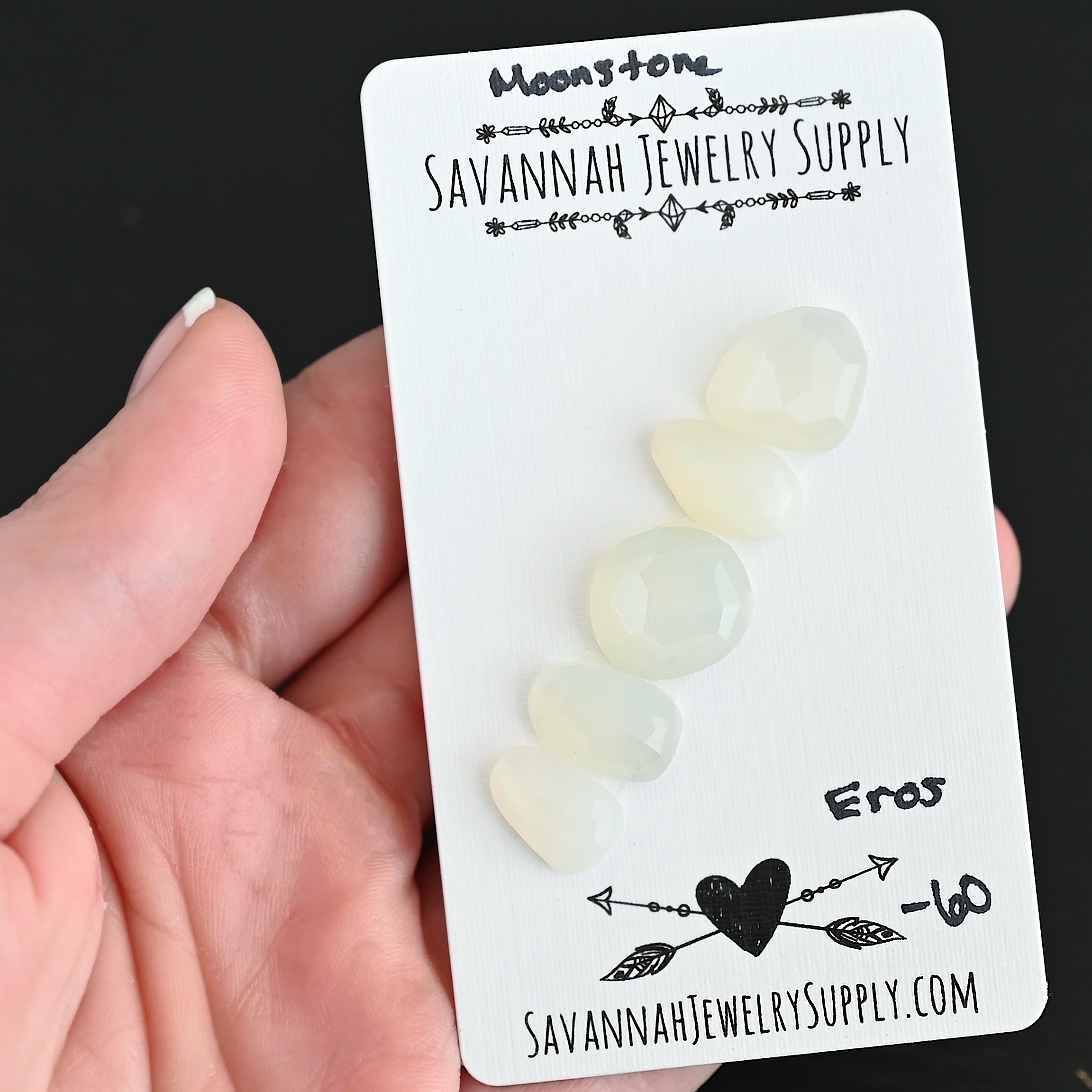 Eros Rose Cut Moonstone Cabochon Parcel shown in hand