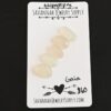 Gaia Rose Cut Moonstone Cabochon Parcel shown on business card