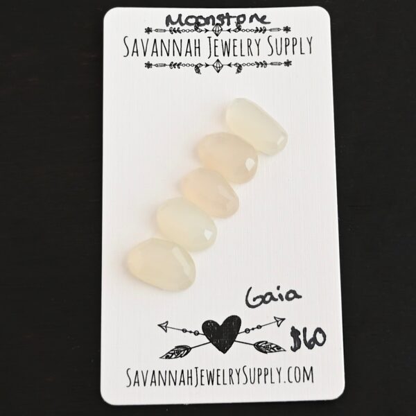 Gaia Rose Cut Moonstone Cabochon Parcel shown on business card
