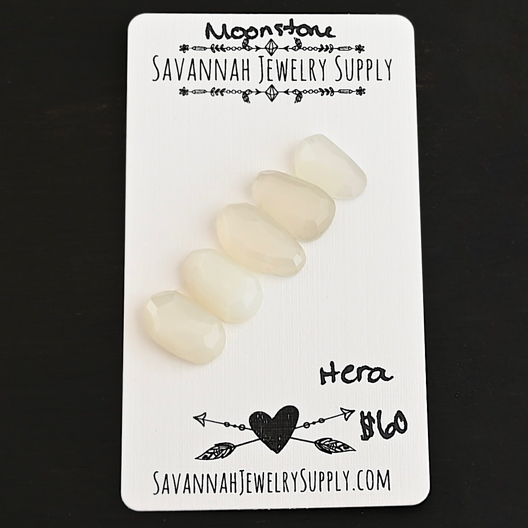 Hera Rose Cut Moonstone Cabochon Parcel shown on business card