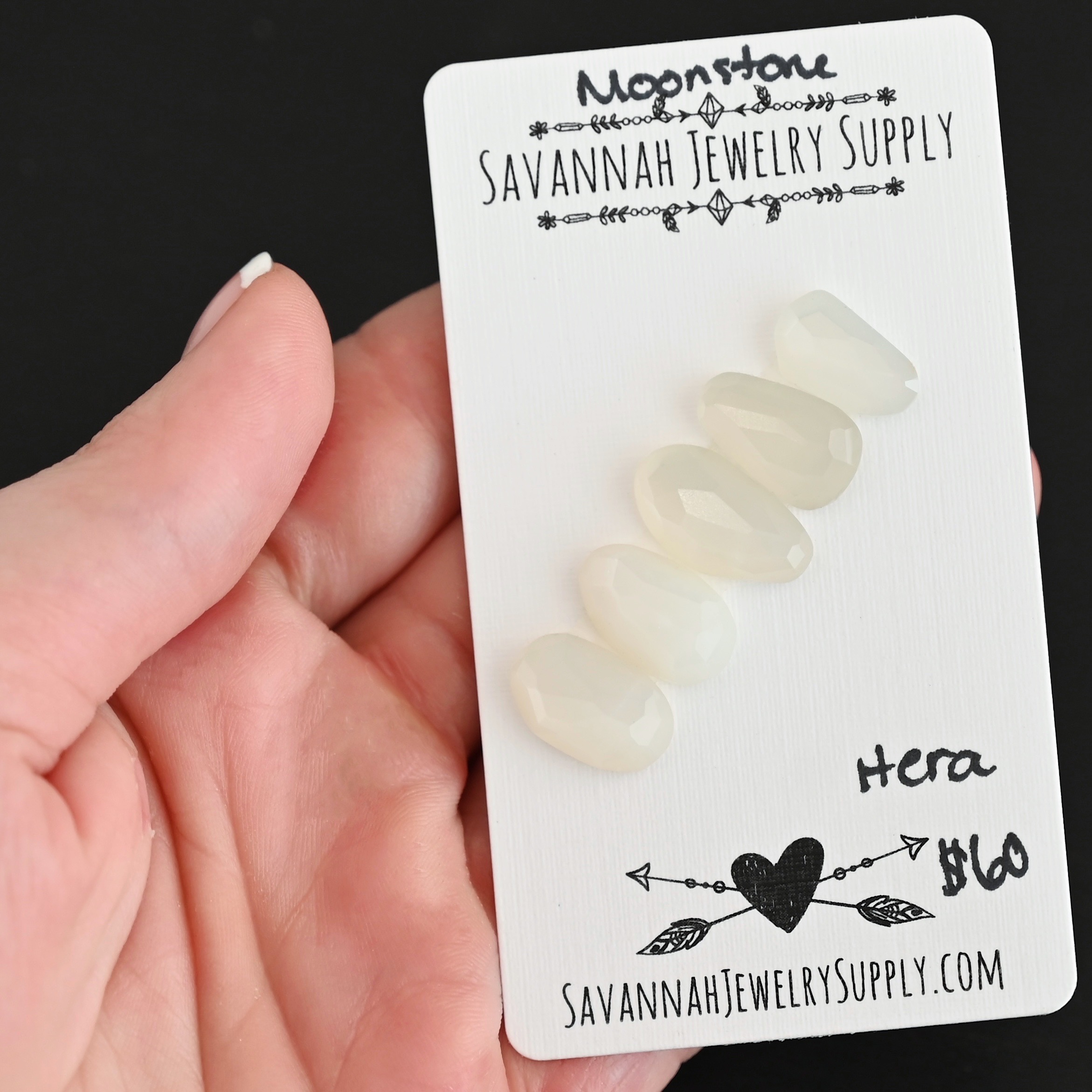 Hera Rose Cut Moonstone Cabochon Parcel shown in hand