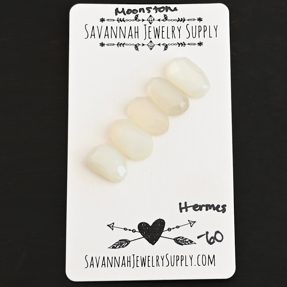 Hermes Rose Cut Moonstone Cabochon Parcel shown on business card
