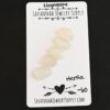 Hestia Rose Cut Moonstone Cabochon Parcel shown on business card