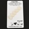 Hypnos Rose Cut Moonstone Cabochon Parcel shown on business card