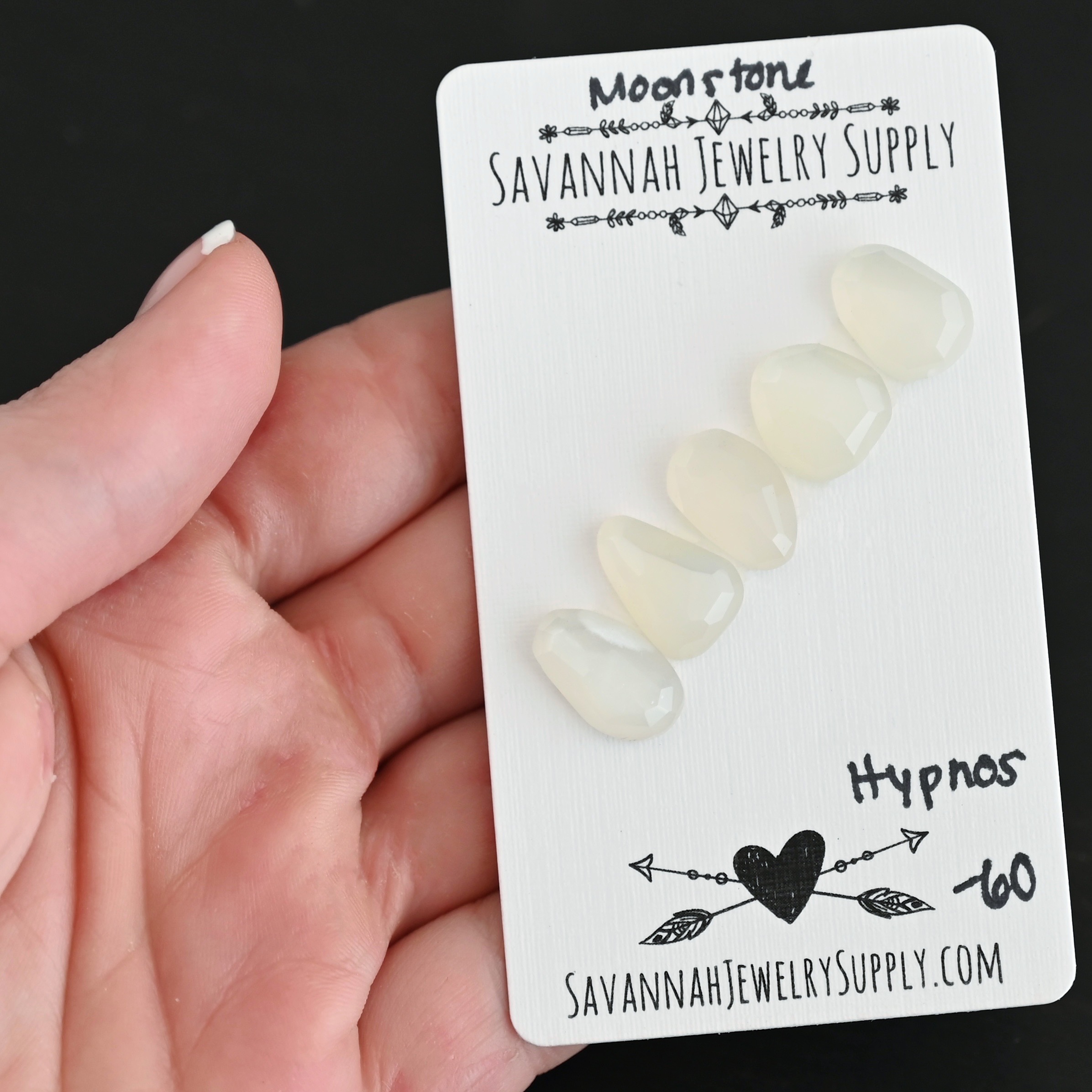 Hyperion Rose Cut Moonstone Cabochon Parcel shown in hand