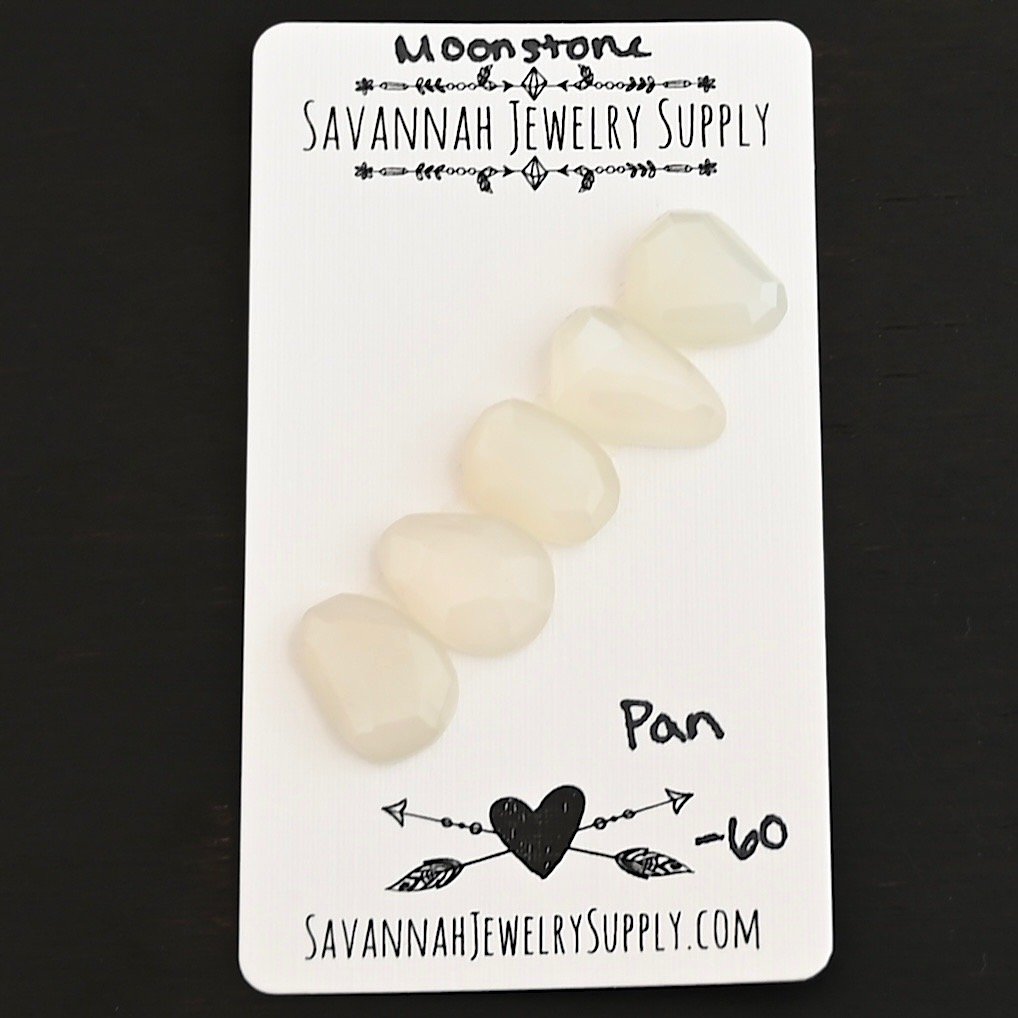 Pan Rose Cut Moonstone Cabochon Parcel shown on business card
