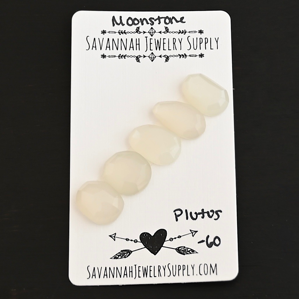 Plutos Rose Cut Moonstone Cabochon Parcel shown on business card