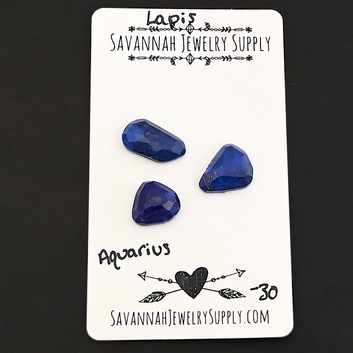 Aquarius Rose Cut Lapis Cabochon Parcel shown on business card