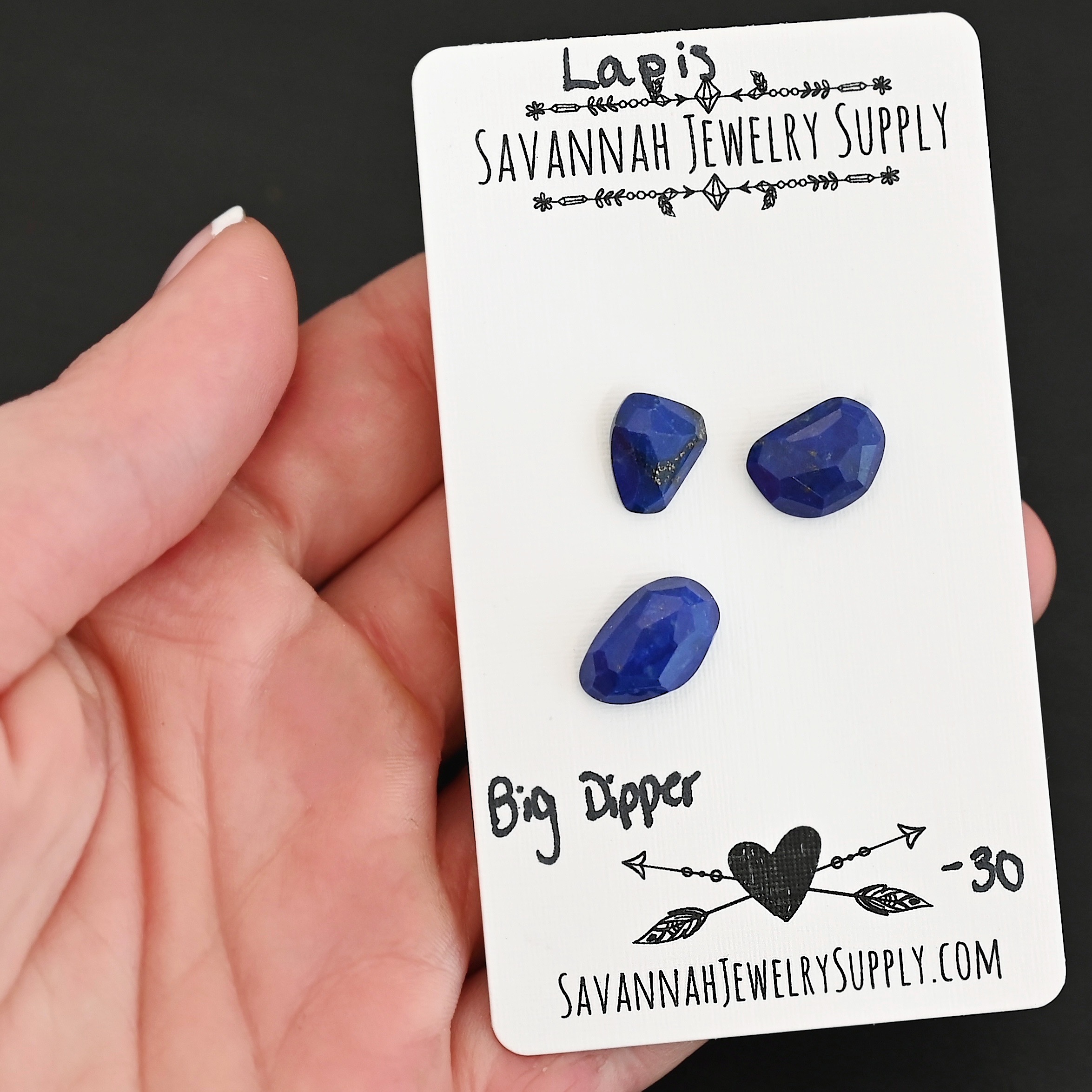 Big Dipper Rose Cut Lapis Cabochon Parcel shown in hand