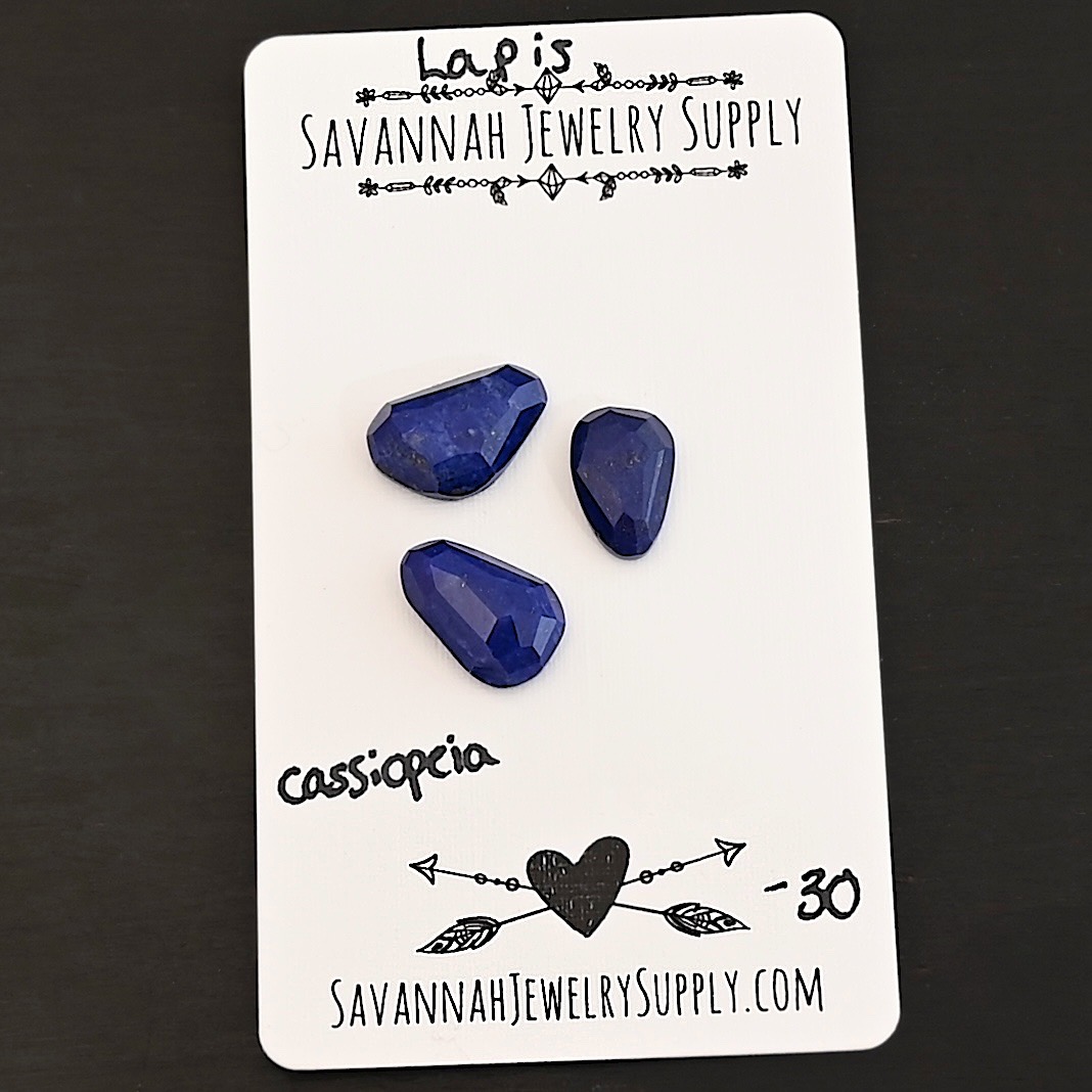 Cassiopeia Rose Cut Lapis Cabochon Parcel shown on business card