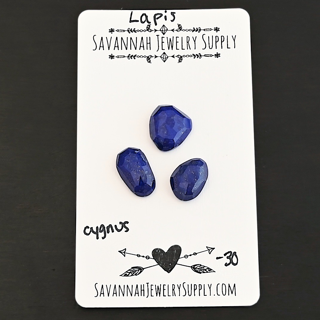 Cygnus Rose Cut Lapis Cabochon Parcel shown on business card