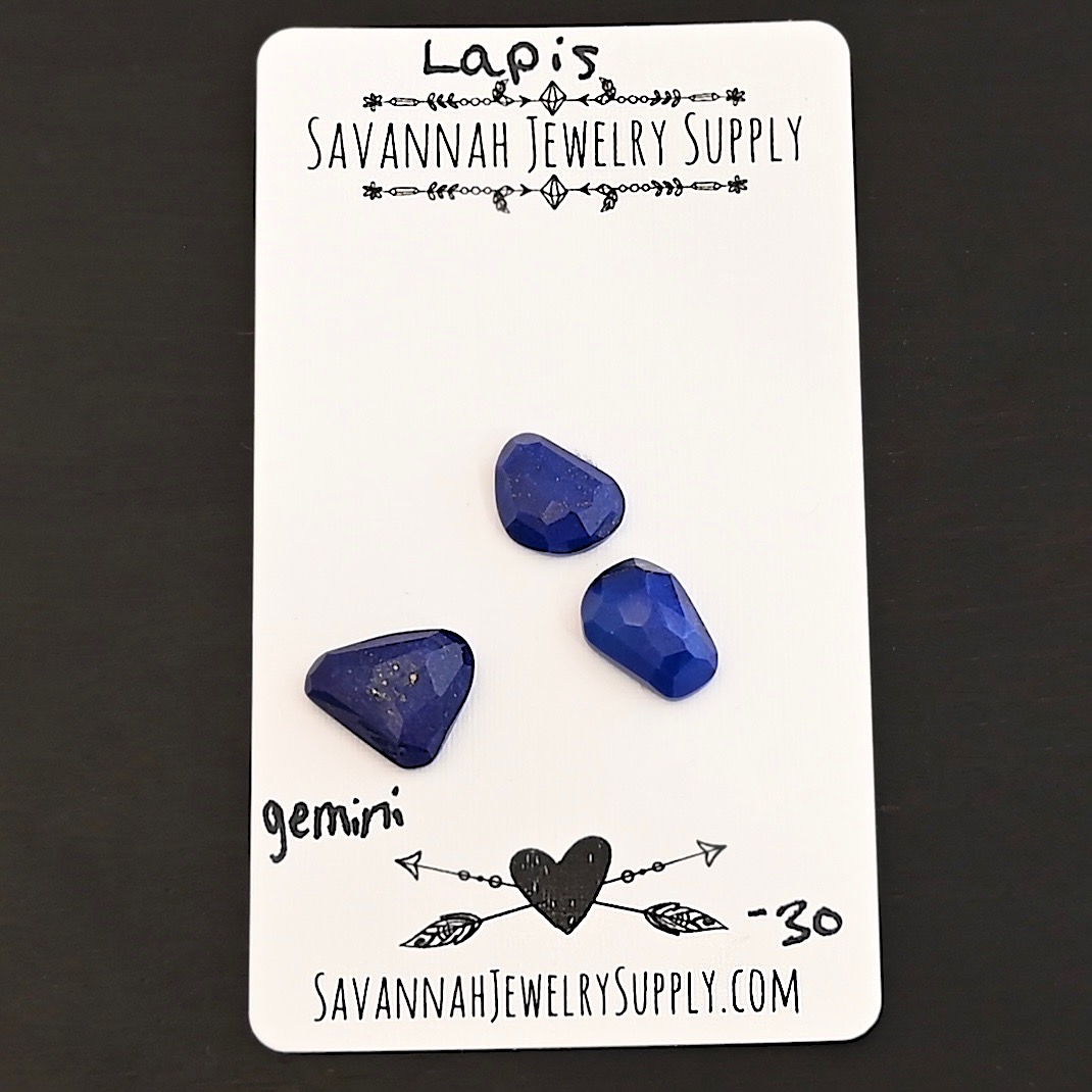 Gemini Rose Cut Lapis Cabochon Parcel shown on business card