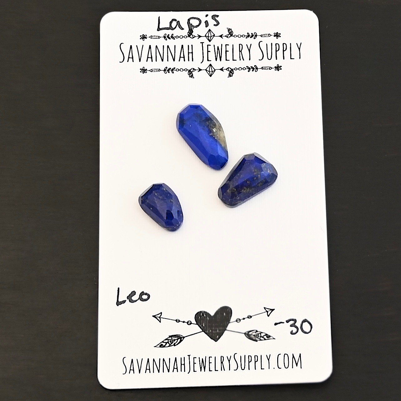 Leo Rose Cut Lapis Cabochon Parcel shown on business card