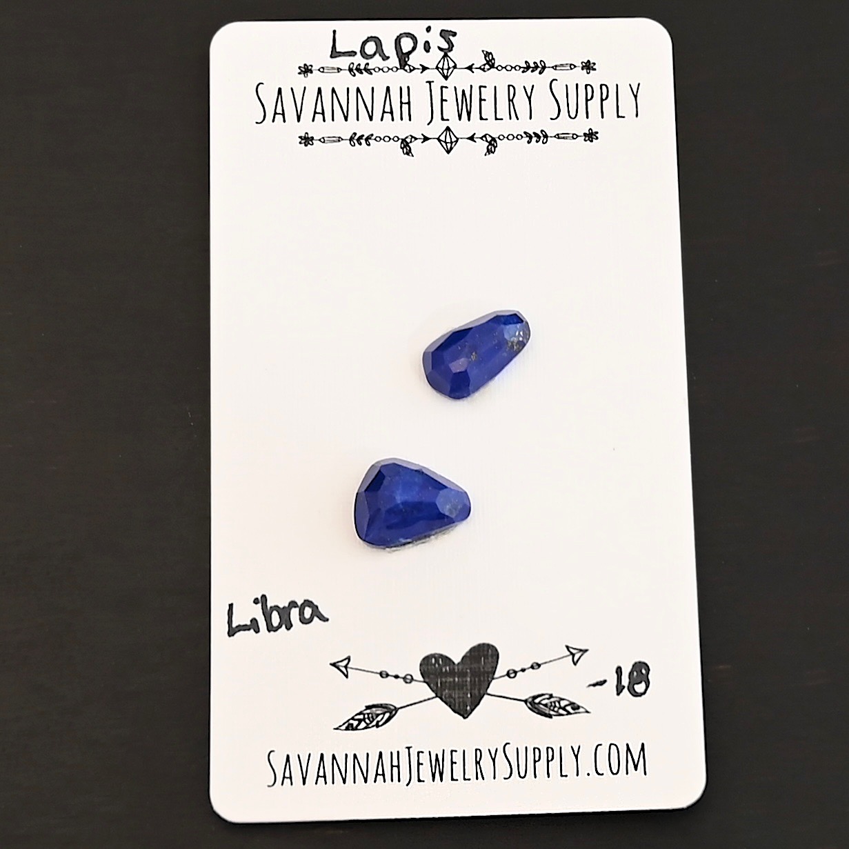 Libra Rose Cut Lapis Cabochon Parcel shown on business card