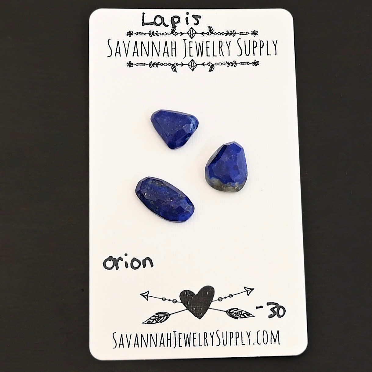 Orion Rose Cut Lapis Cabochon Parcel shown on business card