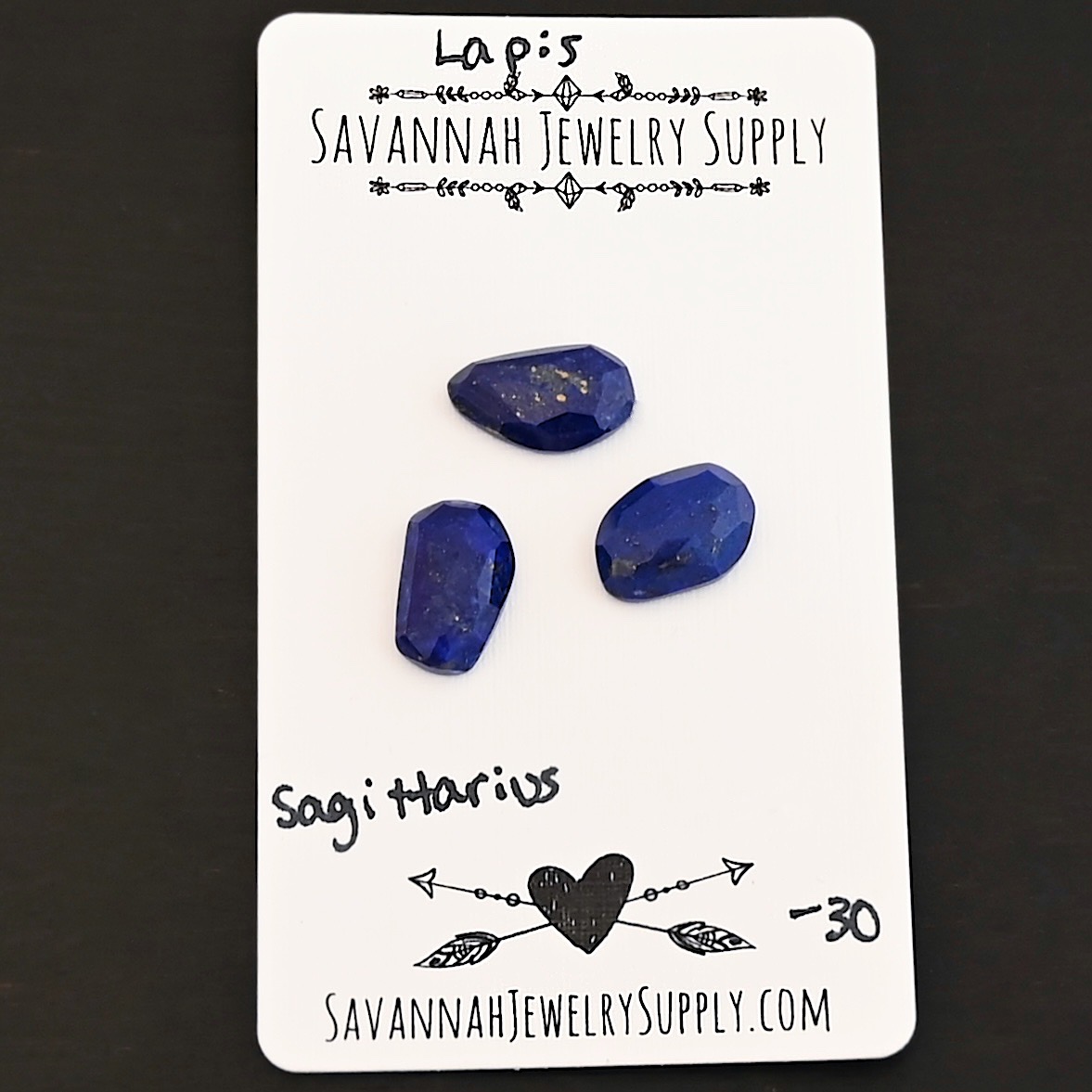 Sagittarius Rose Cut Lapis Cabochon Parcel shown on business card