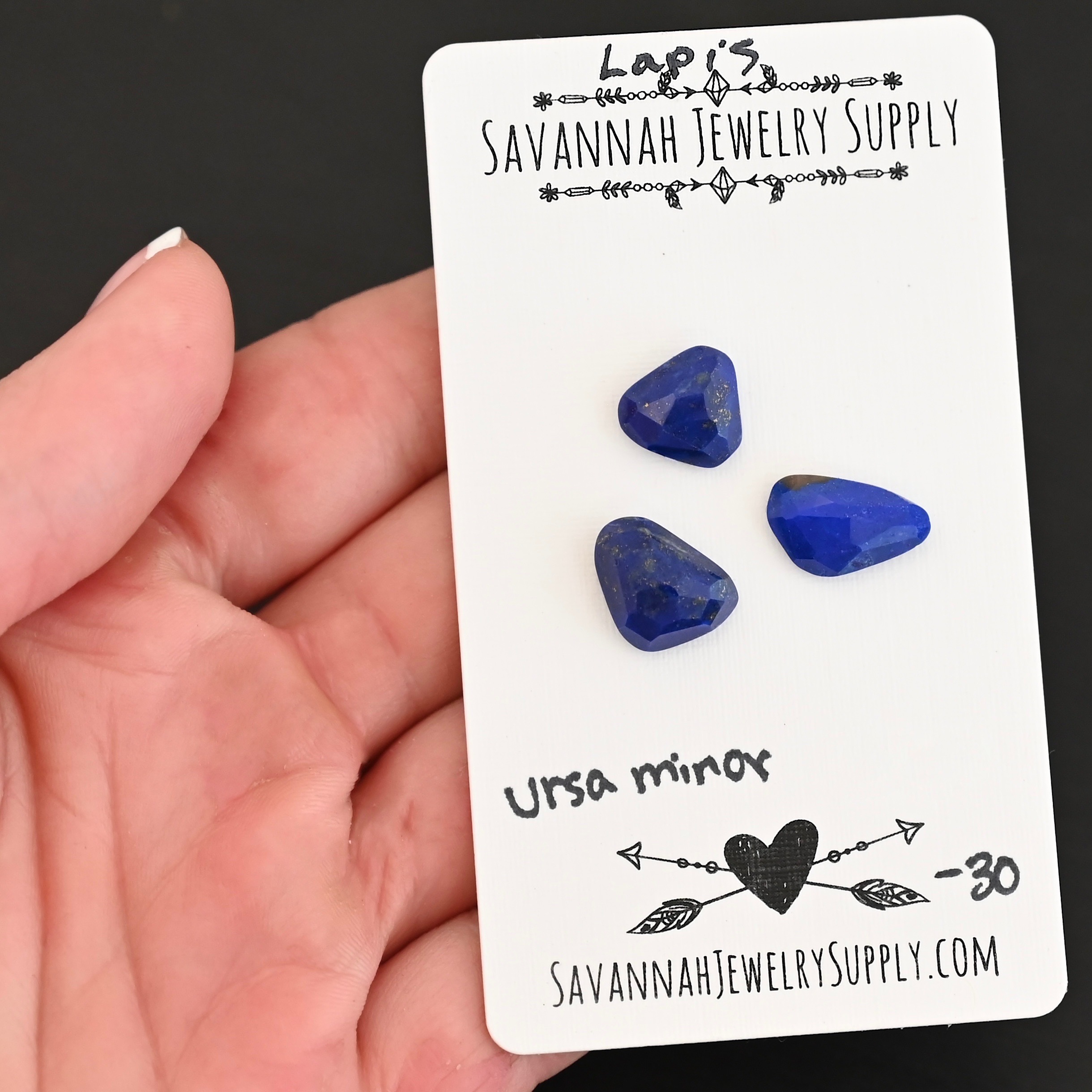 Ursa Minor Rose Cut Lapis Cabochon Parcel shown in hand