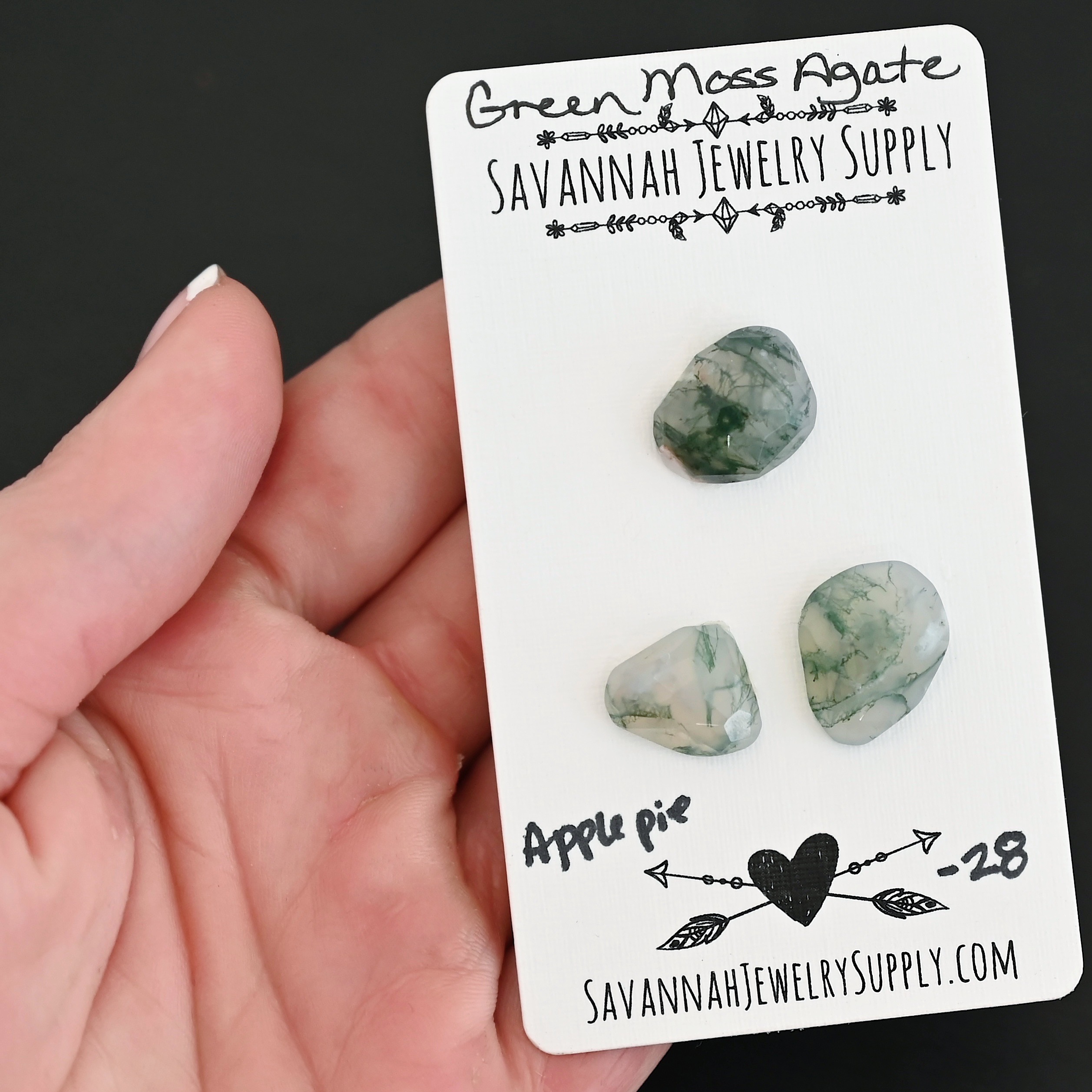 Apple Pie Rose Cut Green Moss Agate Cabochon Parcel shown in hand