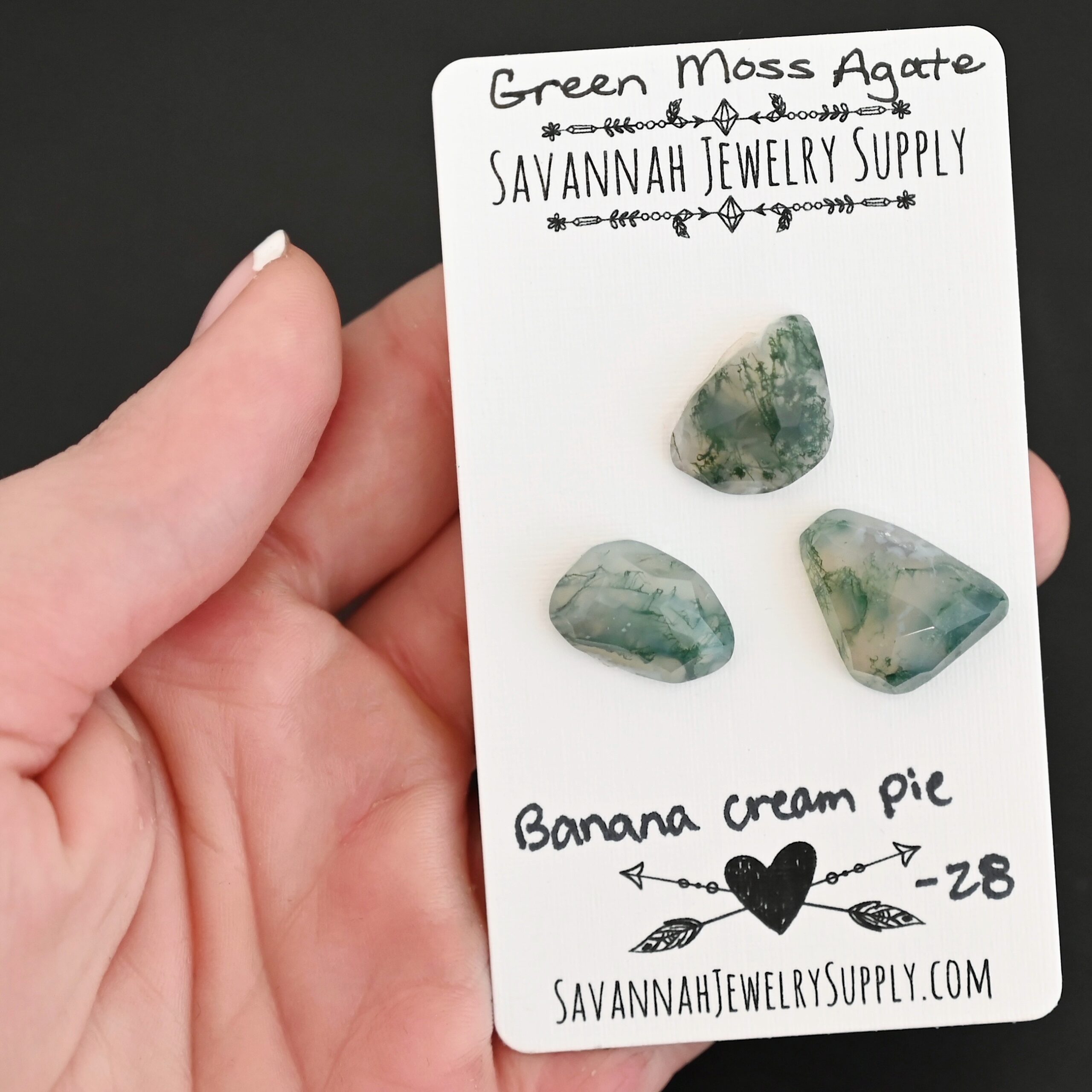 Banana Cream Pie Rose Cut Green Moss Agate Cabochon Parcel shown in hand