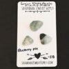Blueberry Pie Rose Cut Green Moss Agate Cabochon Parcel shown on business card