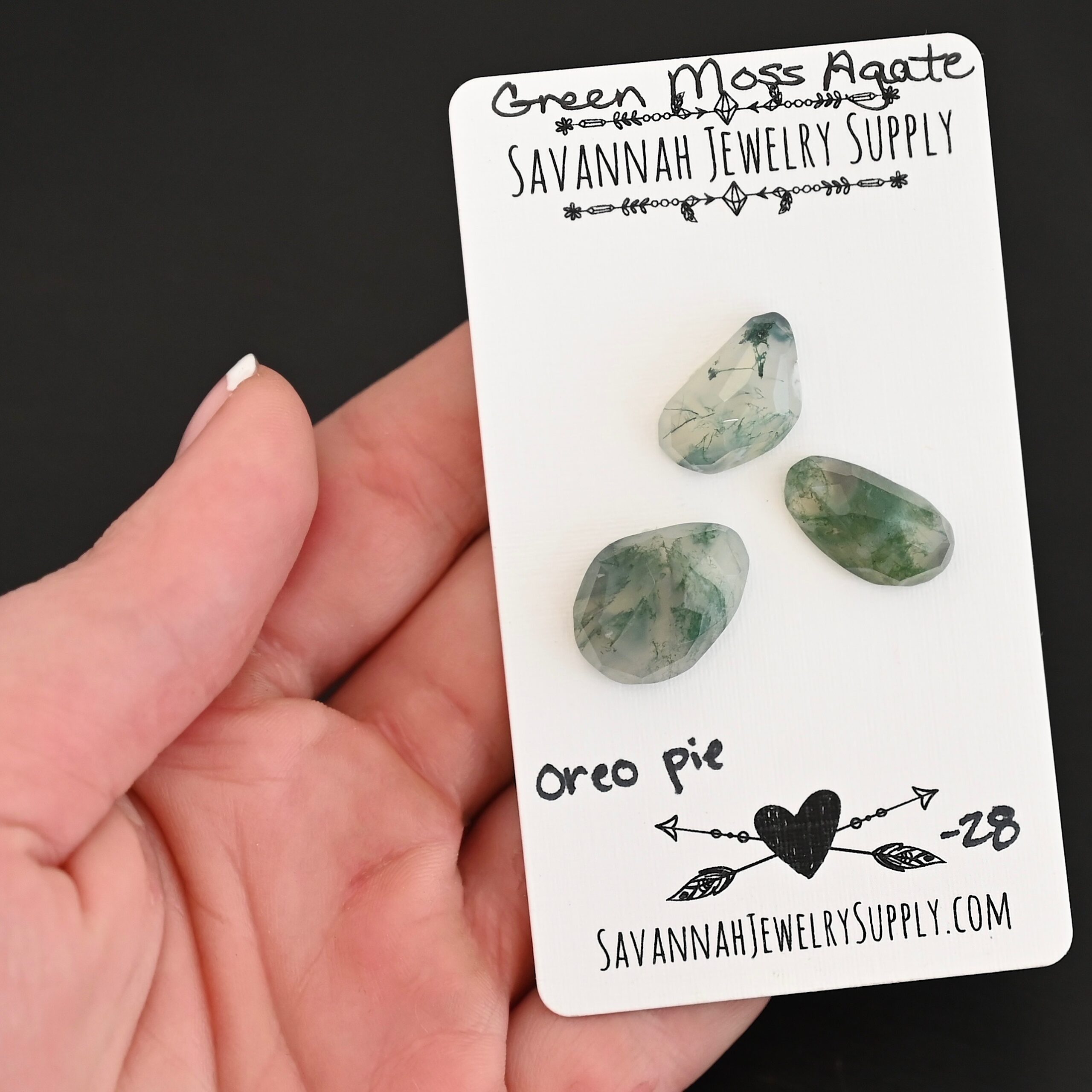 Oreo Pie Rose Cut Green Moss Agate Cabochon Parcel shown in hand