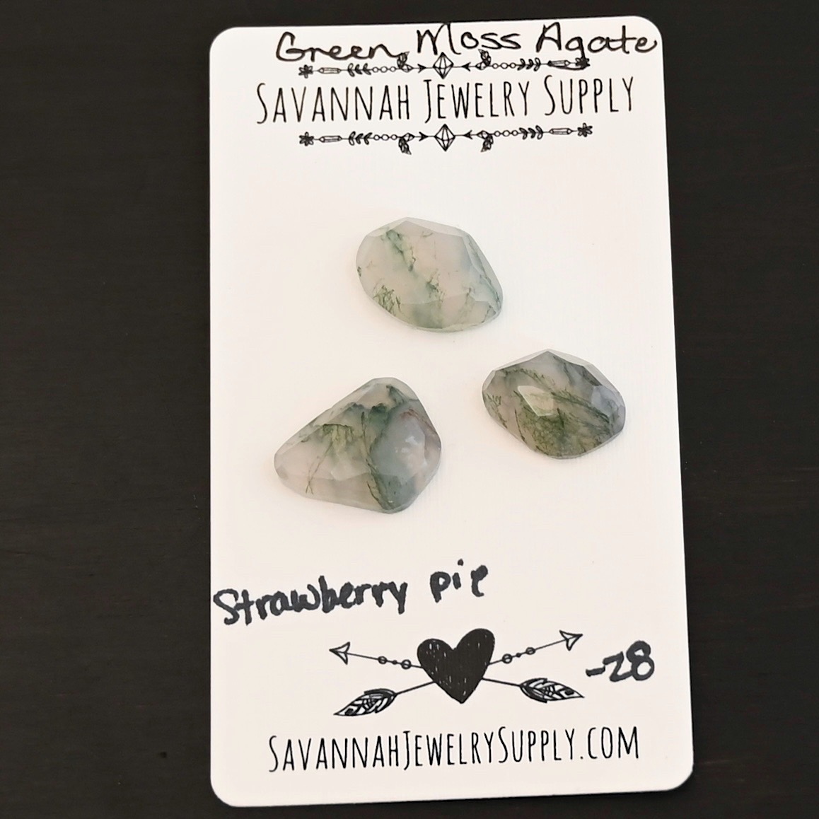 Strawberry Pie Rose Cut Green Moss Agate Cabochon Parcel shown on business card