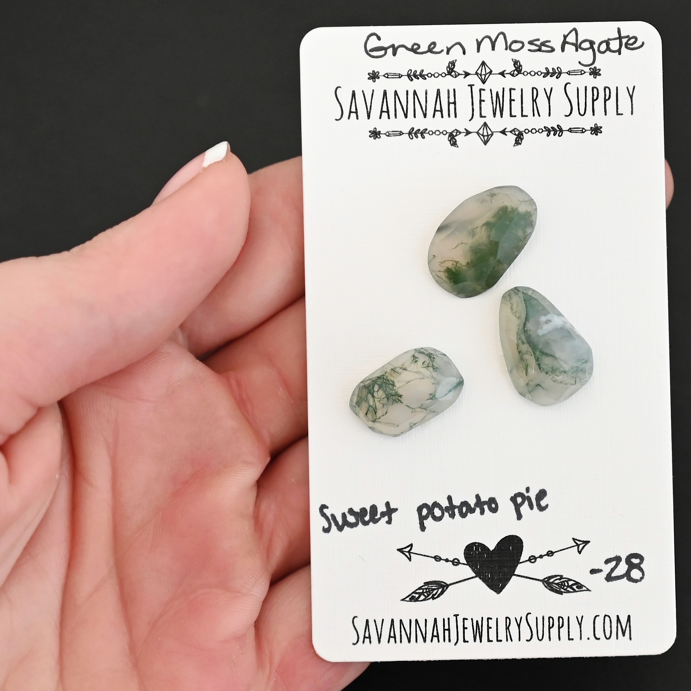 Sweet Potato Pie Rose Cut Green Moss Agate Cabochon Parcel shown in hand