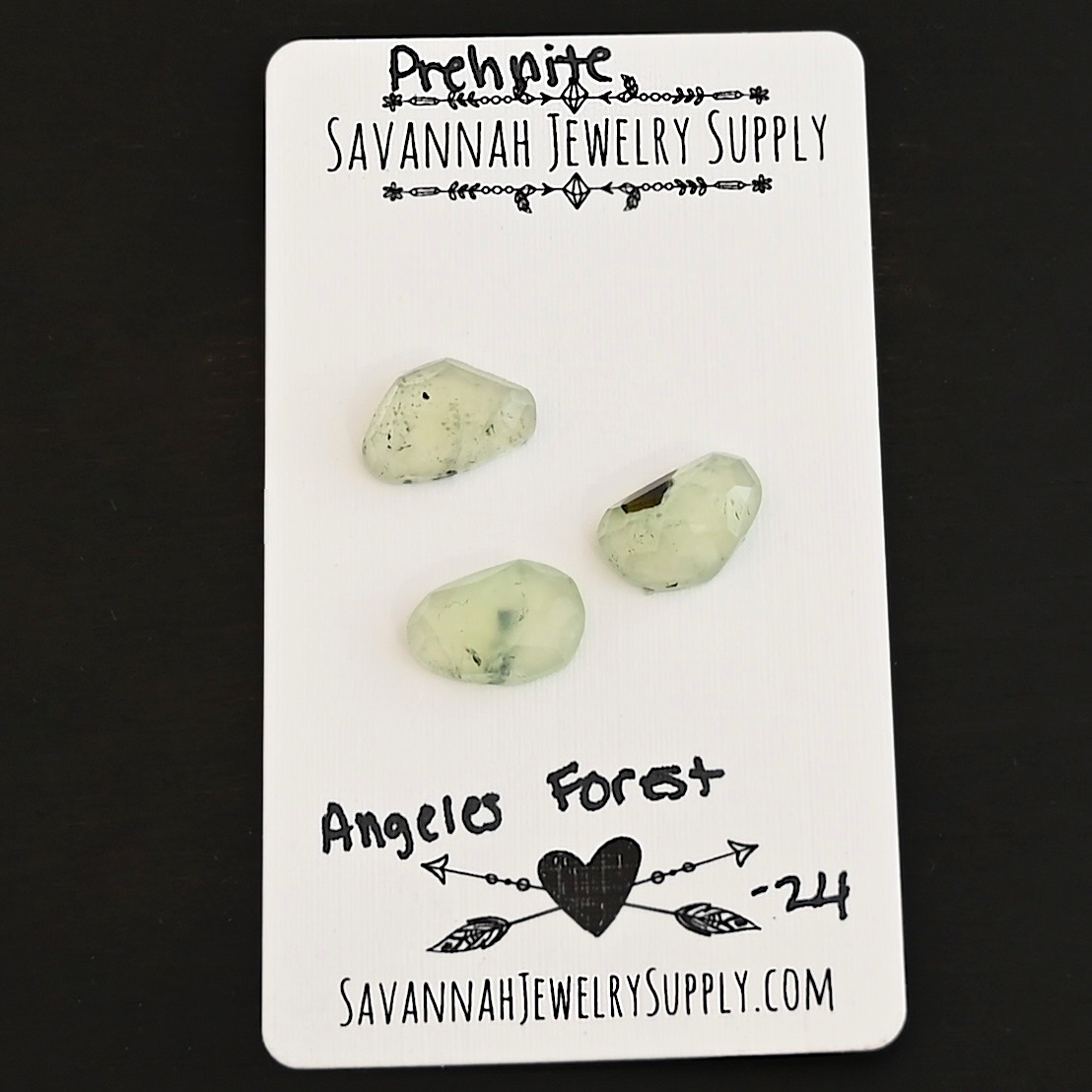 Angeles Forest Rose Cut Prehnite Cabochon Parcel shown on business card