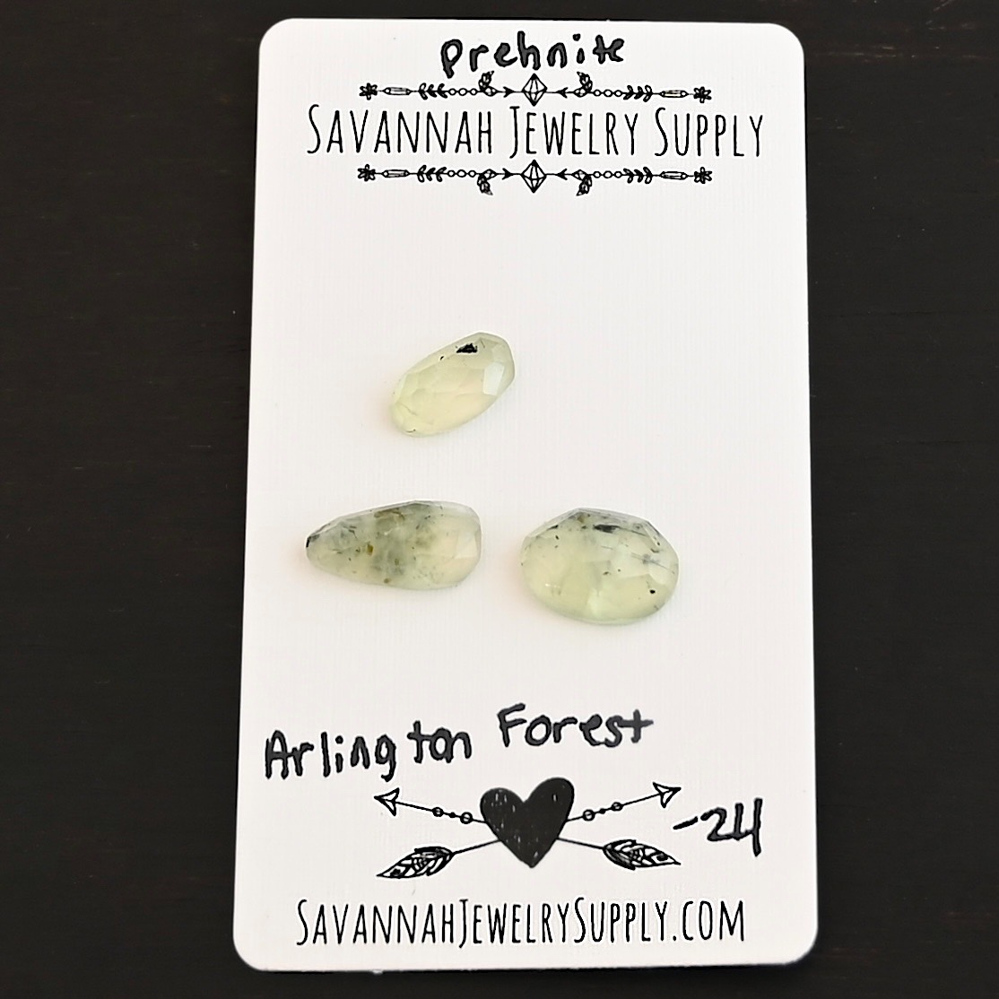 Arlington Forest Rose Cut Prehnite Cabochon Parcel shown on business card