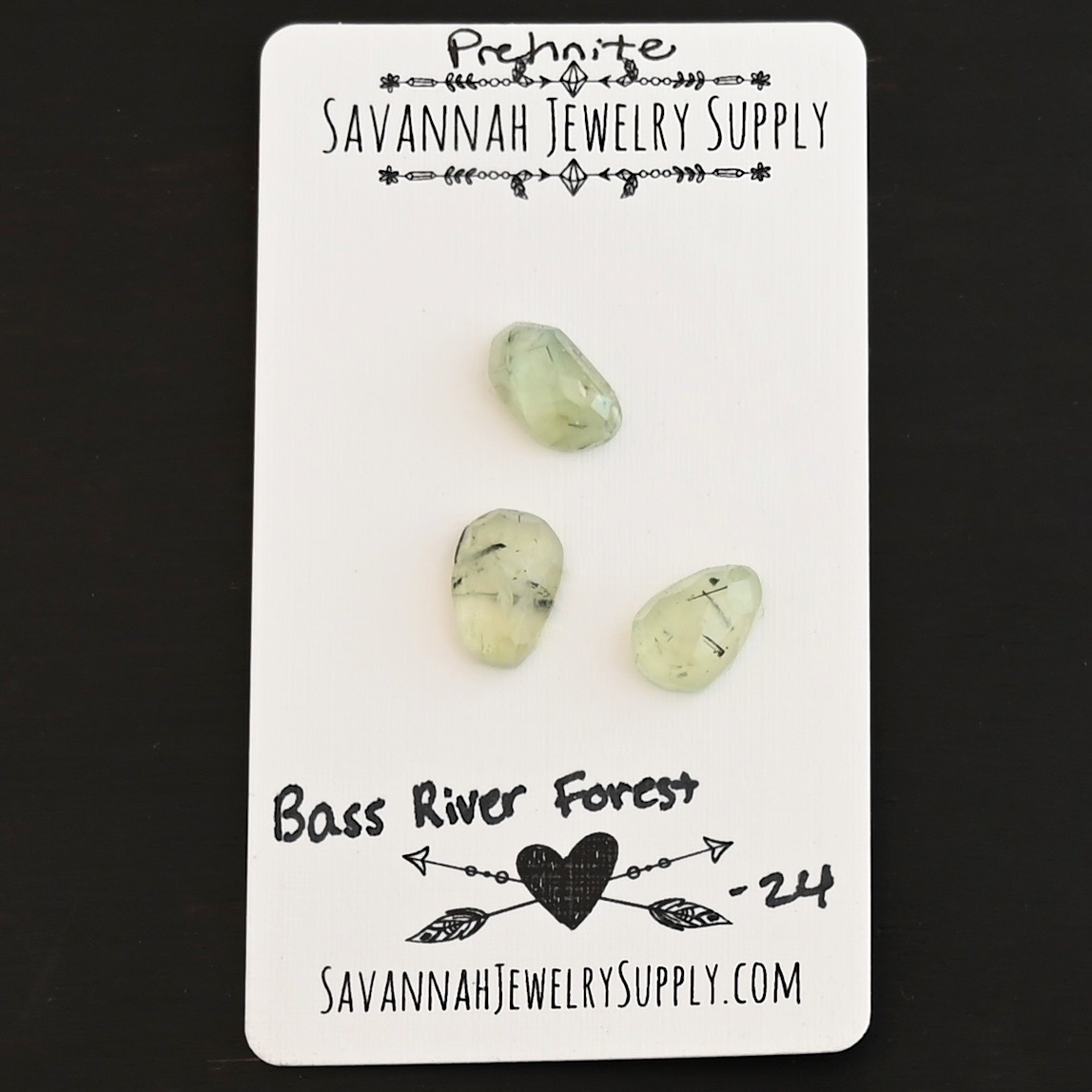 Bass River Forest Rose Cut Prehnite Cabochon Parcel shown on business card