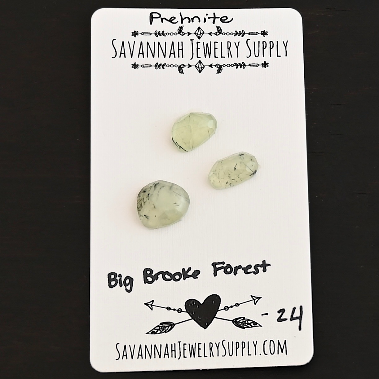 Big Brook Forest Rose Cut Prehnite Cabochon Parcel shown on business card