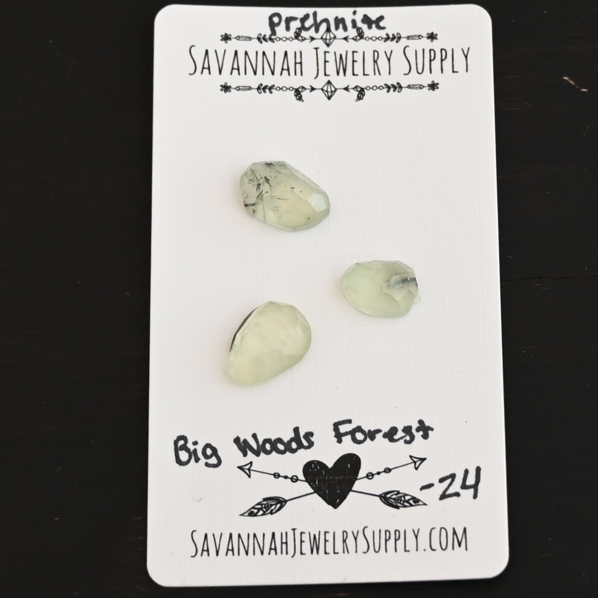 Big Woods Forest Rose Cut Prehnite Cabochon Parcel shown on business card