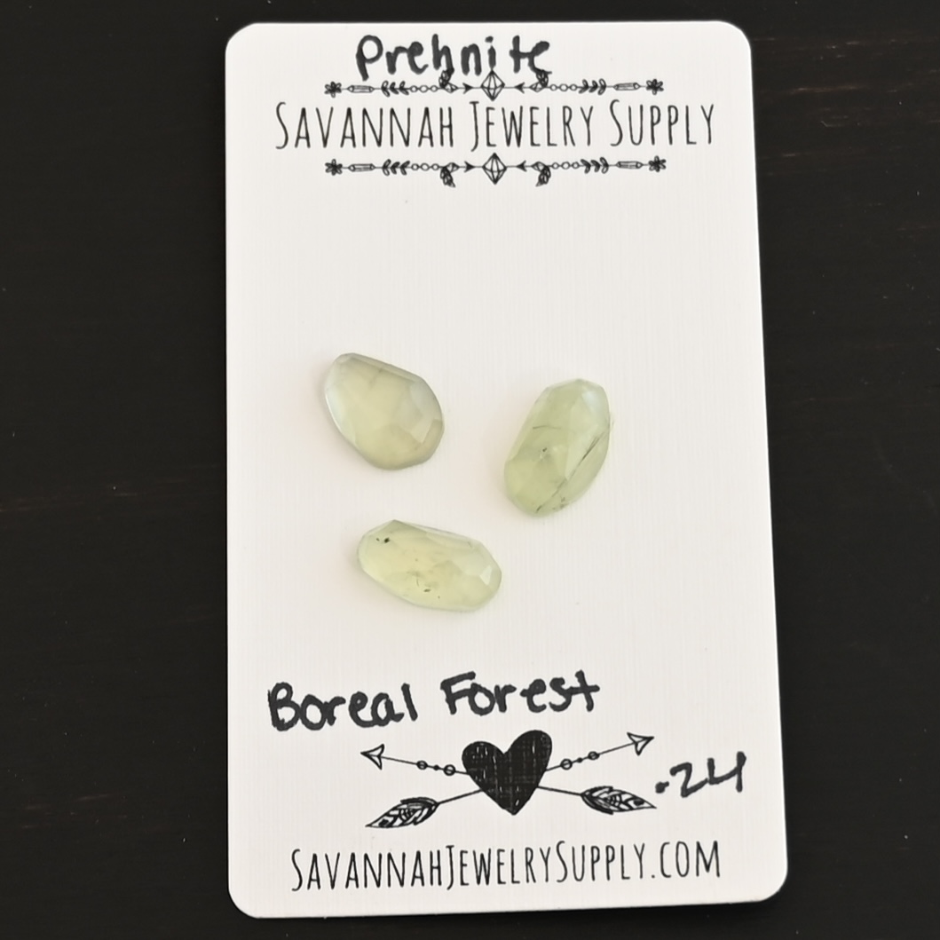 Boreal Forest Rose Cut Prehnite Cabochon Parcel shown on business card