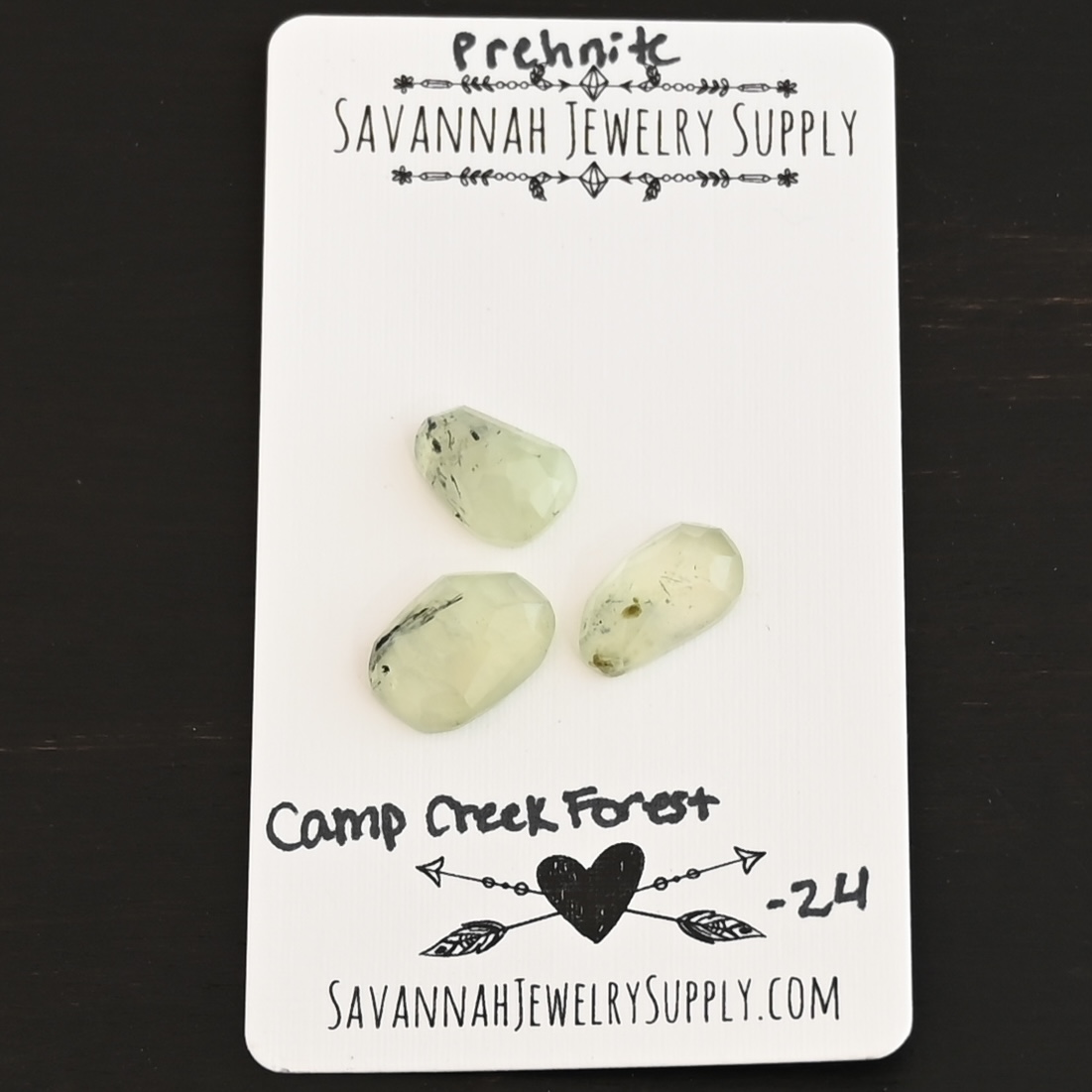 Camp Creek Forest Rose Cut Prehnite Cabochon Parcel shown on business card