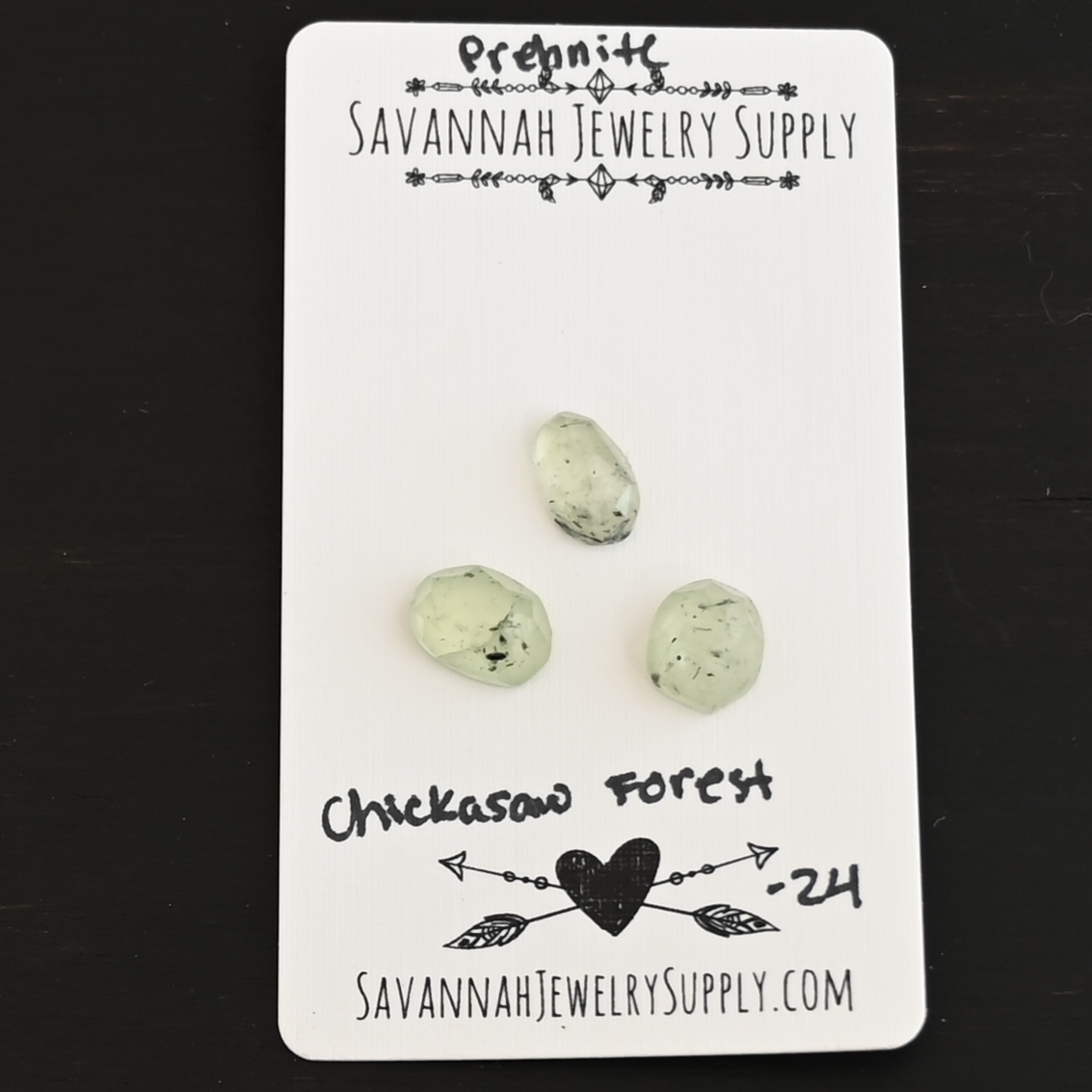 Chickasaw Forest Rose Cut Prehnite Cabochon Parcel shown on business card