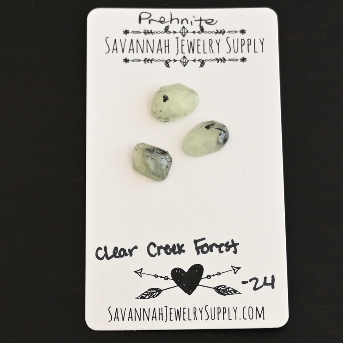 Clear Creek Forest Rose Cut Prehnite Cabochon Parcel shown on business card