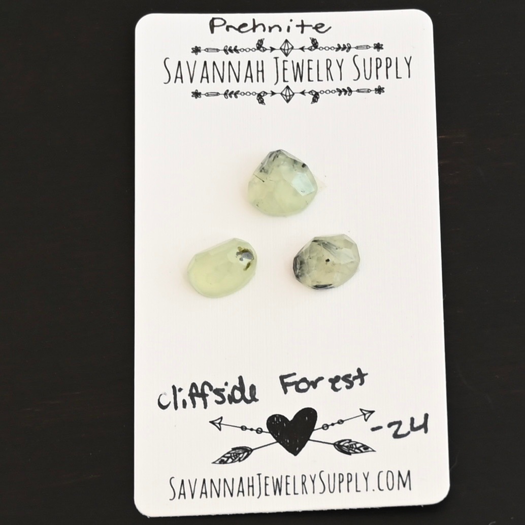 Cliffside Forest Rose Cut Prehnite Cabochon Parcel shown on business card