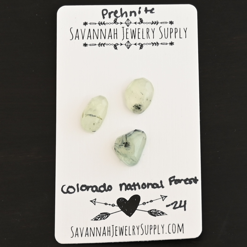 Colorado National Forest Rose Cut Prehnite Cabochon Parcel shown on business card