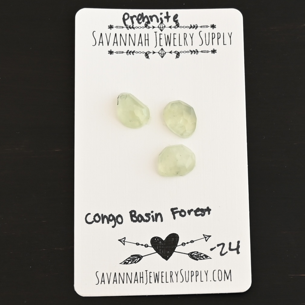 Congo Basin Forest Rose Cut Prehnite Cabochon Parcel shown on business card