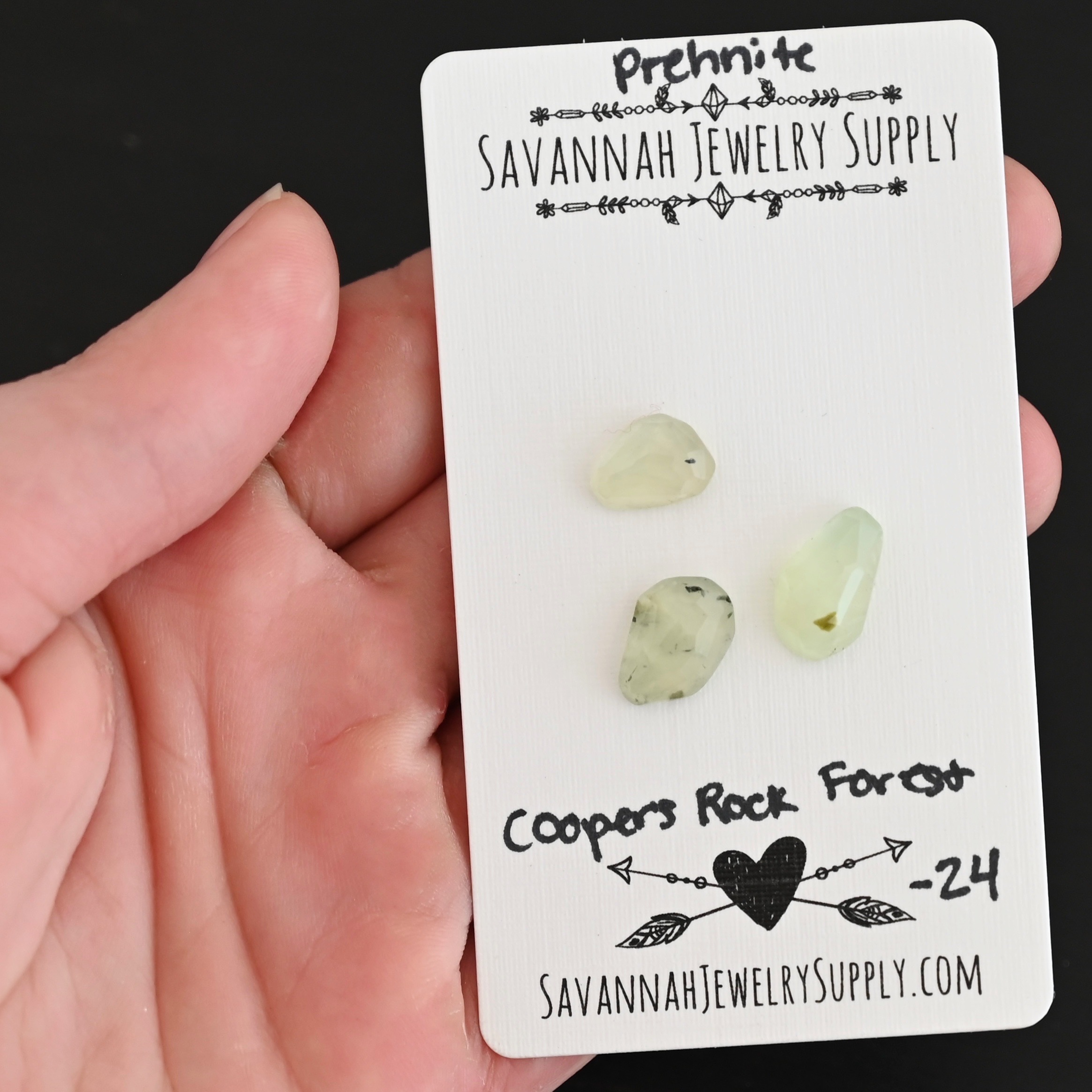 Coopers Rock Forest Rose Cut Prehnite Cabochon Parcel shown in hand