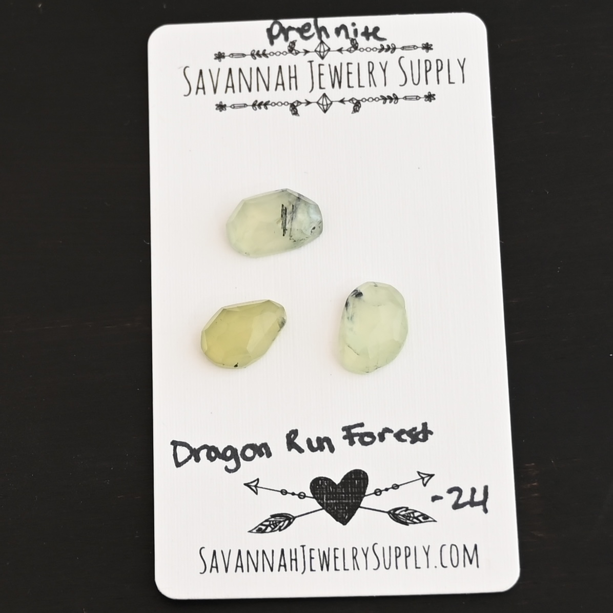 Dragon Run Forest Rose Cut Prehnite Cabochon Parcel shown on business card