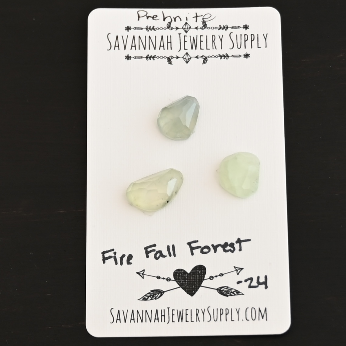 Fire Fall State Forest Rose Cut Prehnite Cabochon Parcel shown on business card