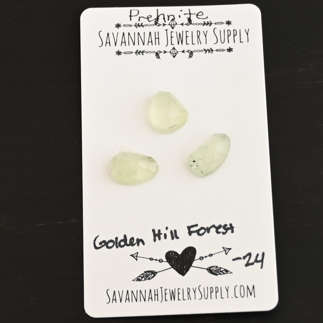 Golden Hill Forest Rose Cut Prehnite Cabochon Parcel shown on business card