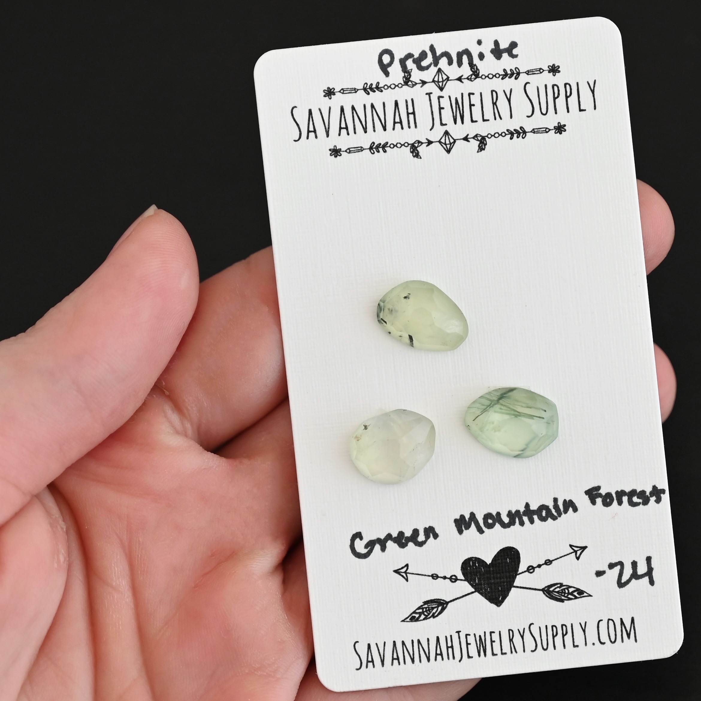 Green Mountain Forest Rose Cut Prehnite Cabochon Parcel shown in hand