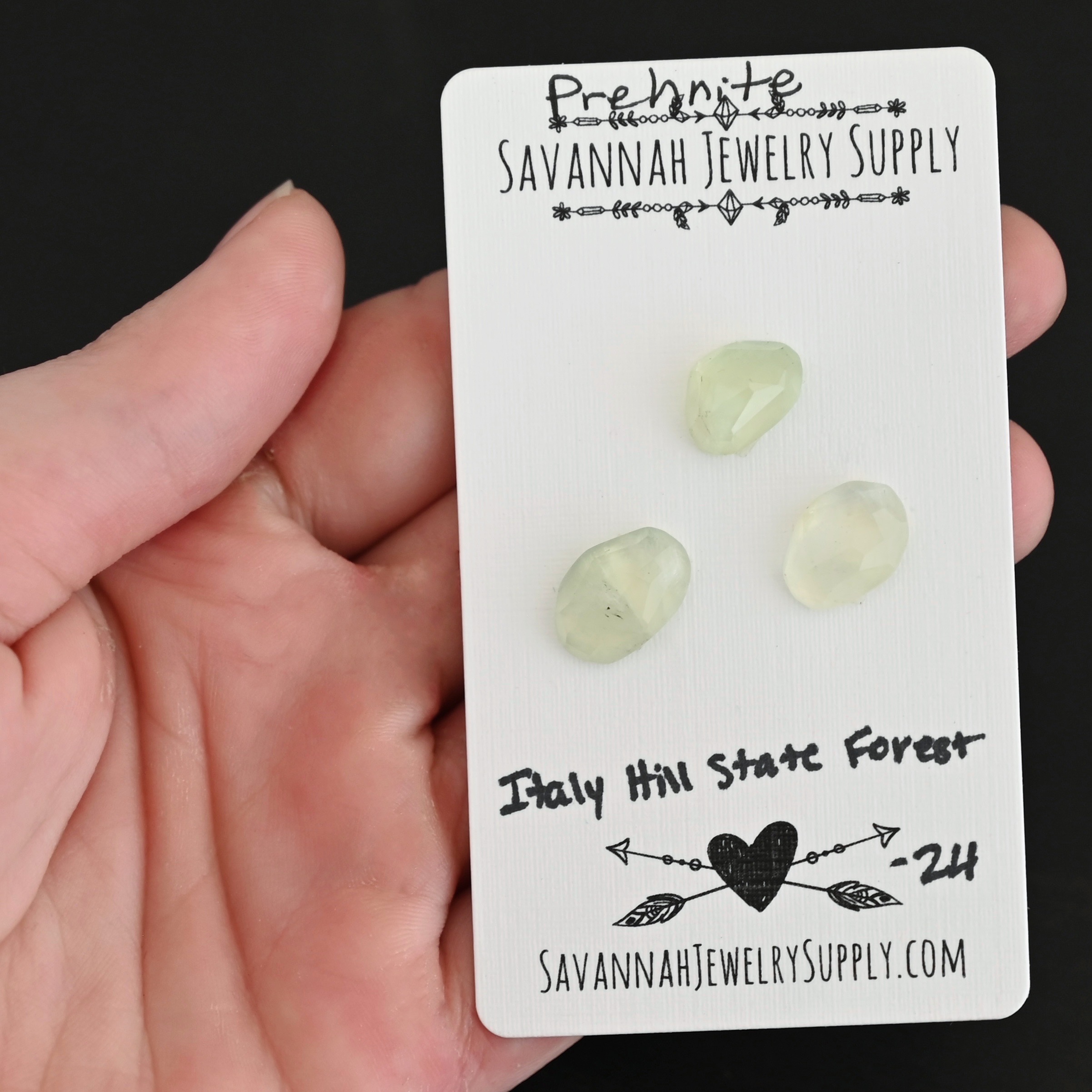 Italy Hill State Forest Rose Cut Prehnite Cabochon Parcel shown in hand