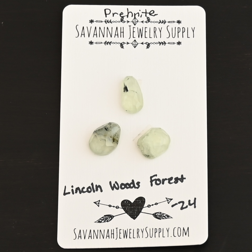 Lincoln Woods Forest Rose Cut Prehnite Cabochon Parcel shown on business card