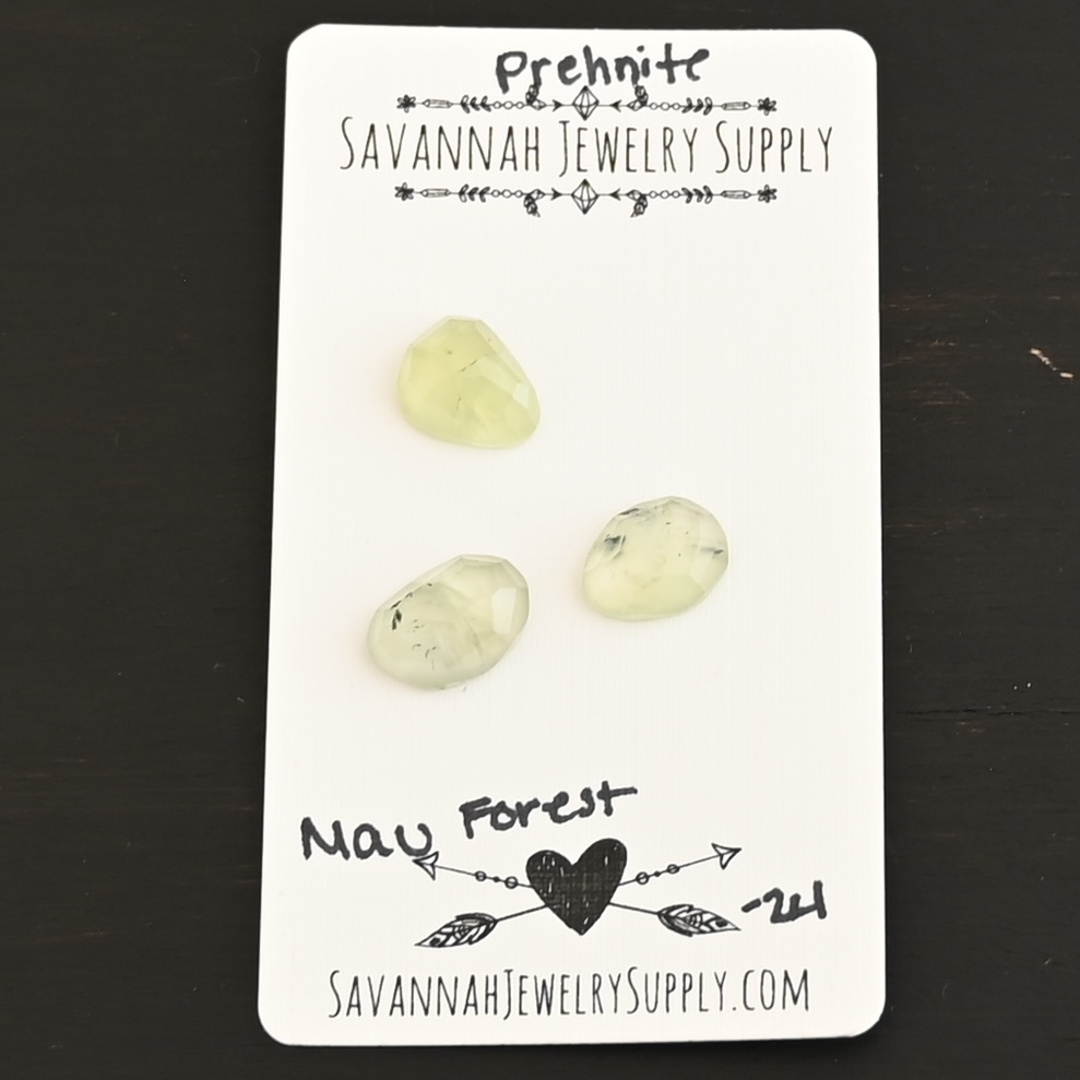 Mau Forest Rose Cut Prehnite Cabochon Parcel shown on business card
