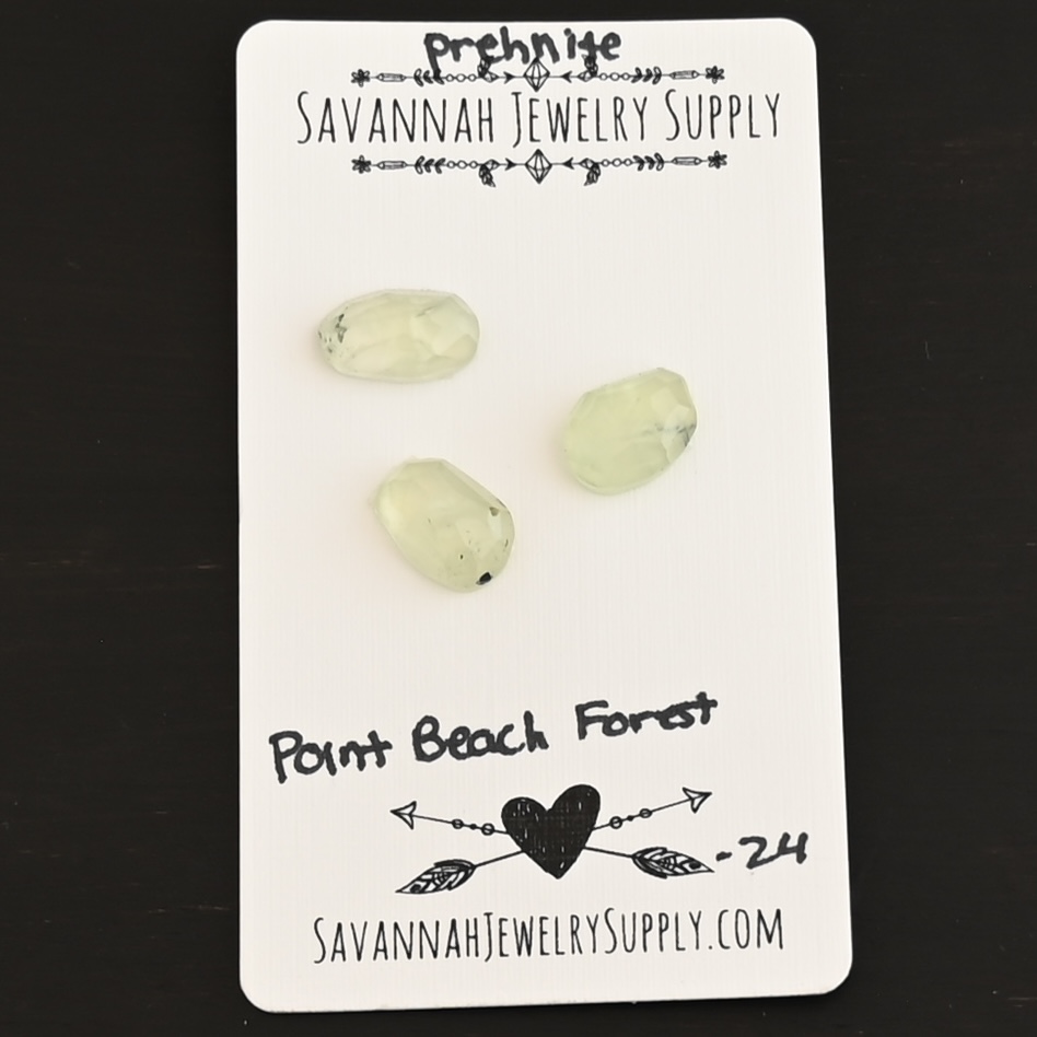 Point Beach Forest Rose Cut Prehnite Cabochon Parcel shown on business card